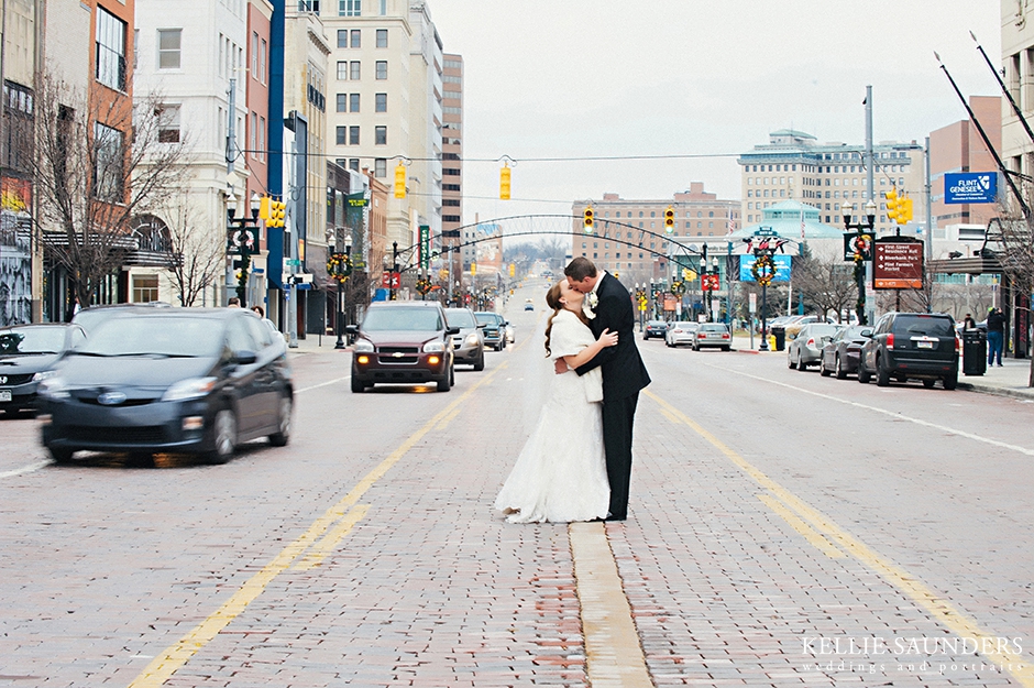 Bride and groom on busy street